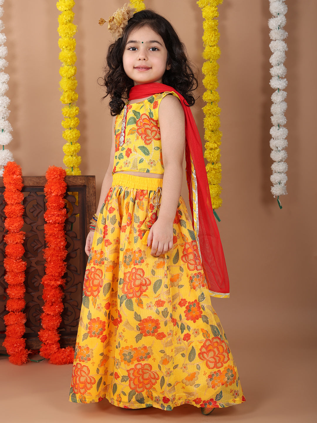 Yellow Kota printed Lehenga with sleeveless lace work top and dupatta