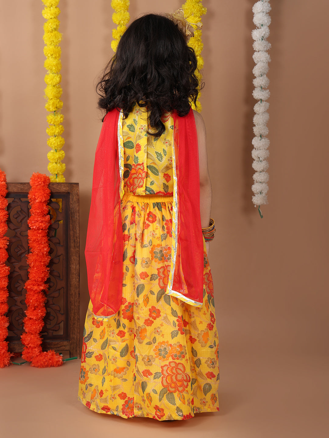 Yellow Kota printed Lehenga with sleeveless lace work top and dupatta