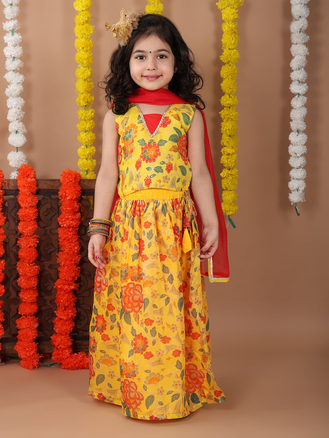 Yellow Kota printed Lehenga with sleeveless patch work top and dupatta