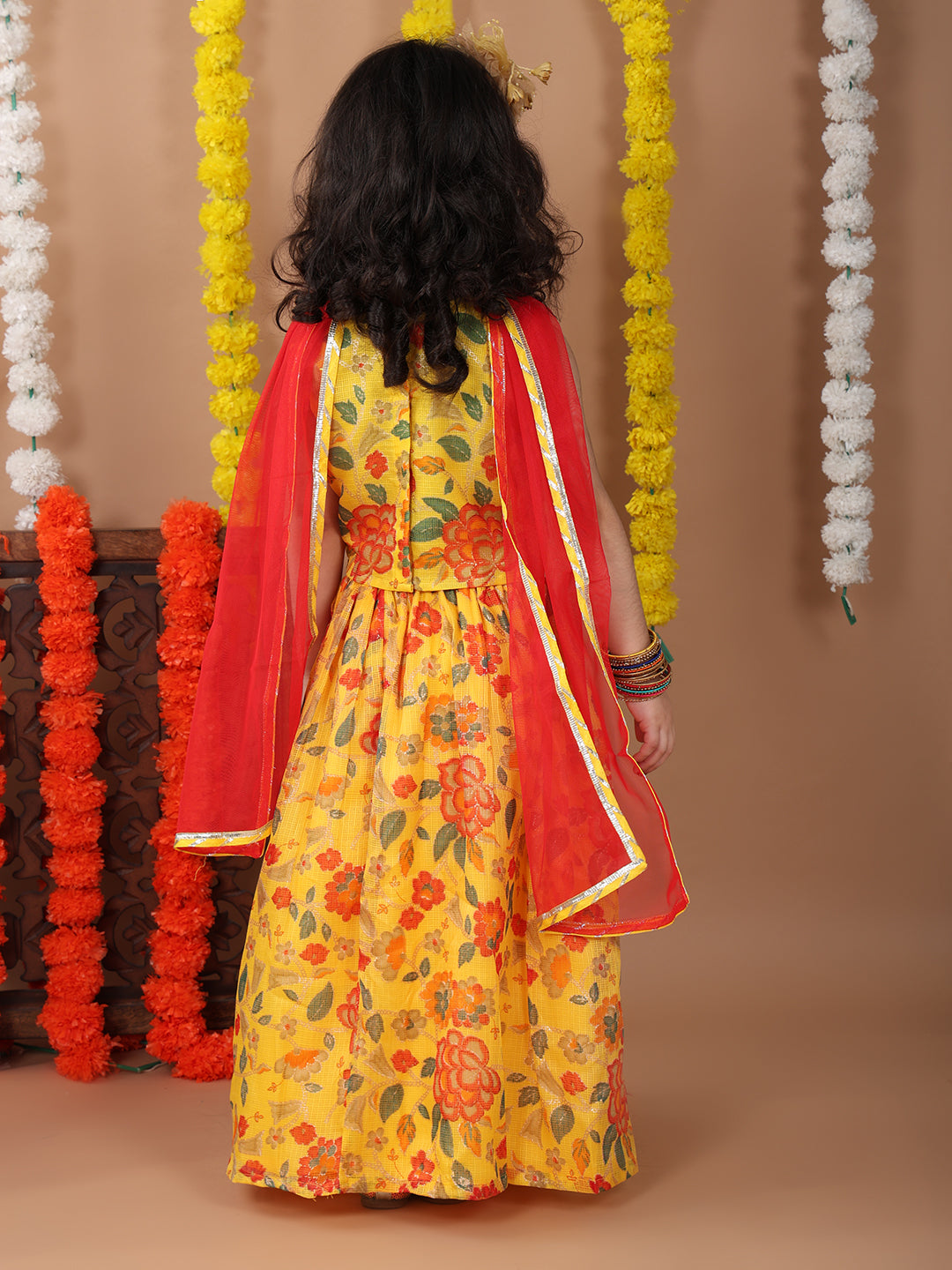 Yellow Kota printed Lehenga with sleeveless patch work top and dupatta
