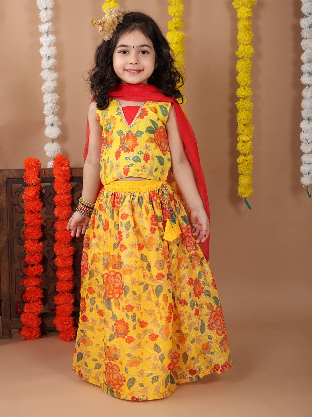 Yellow Kota printed Lehenga with sleeveless patch work top and dupatta