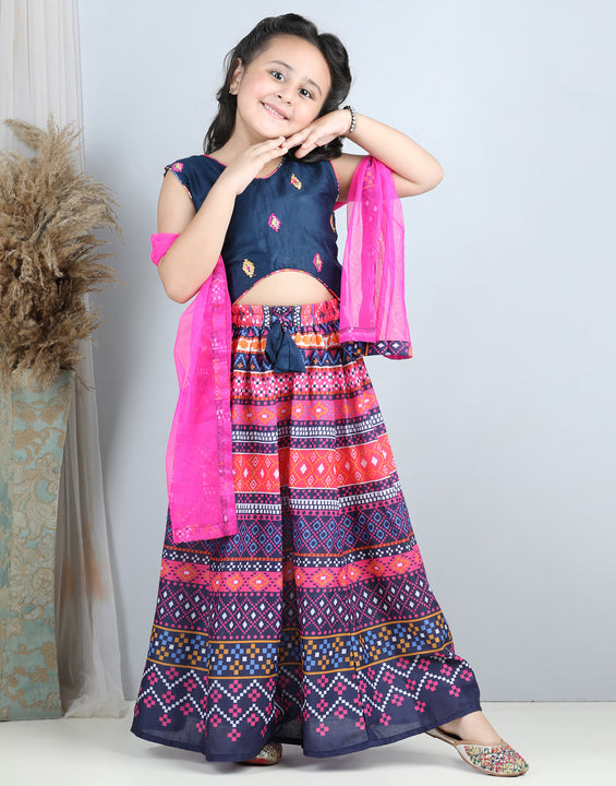Embroidered Top with printed blue lehenga and dupatta