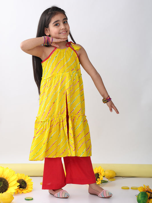 Yellow sleeveless lehriya Kurti with red pant