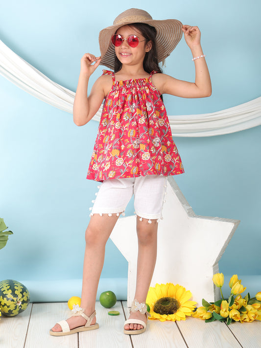 Red sleeveless Top with white short pant