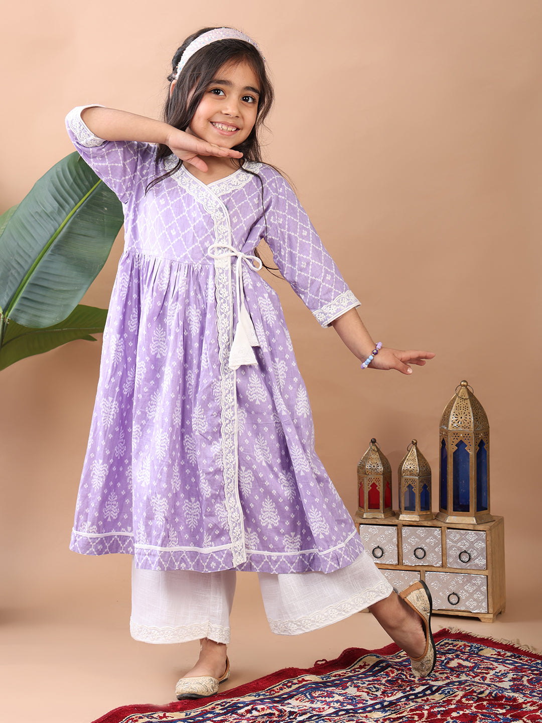 Purple Angrakha Kurti paired with white Plazo pant