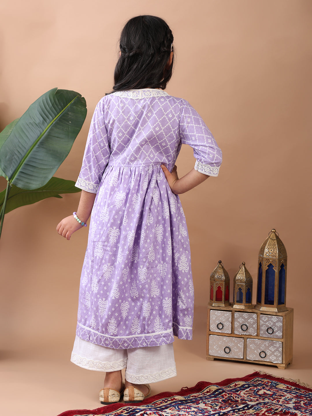 Purple Angrakha Kurti paired with white Plazo pant