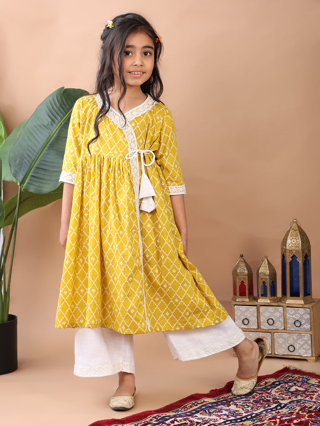 Yellow Angrakha Kurti paired with white Plazo pant