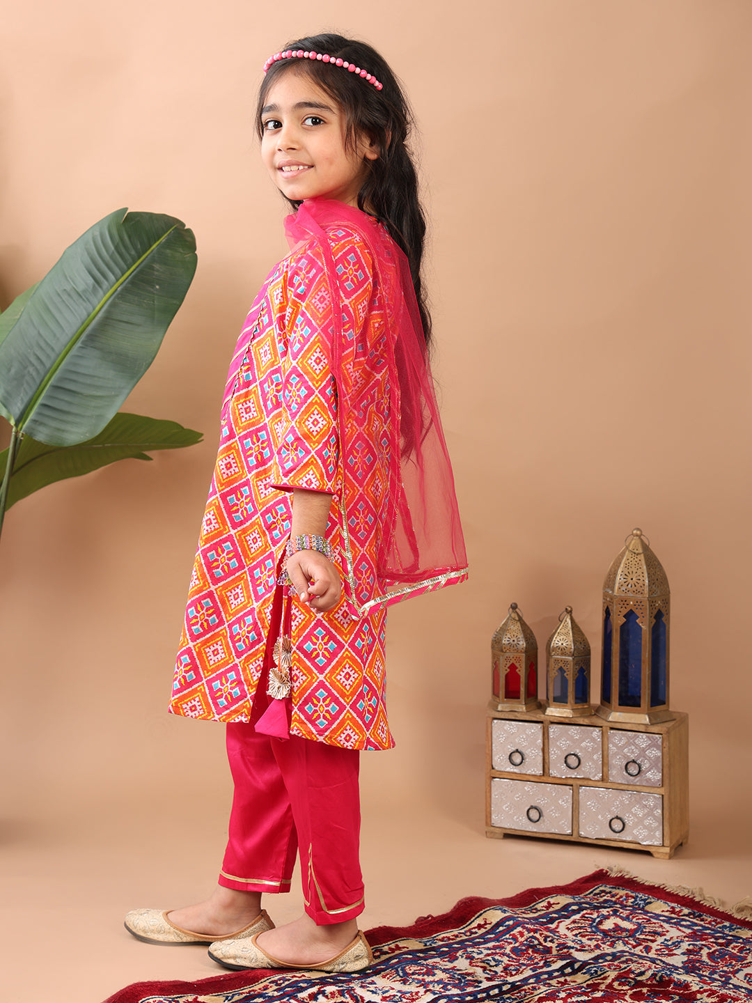 Red Kurti paired with pink Plazo pant and dupatta