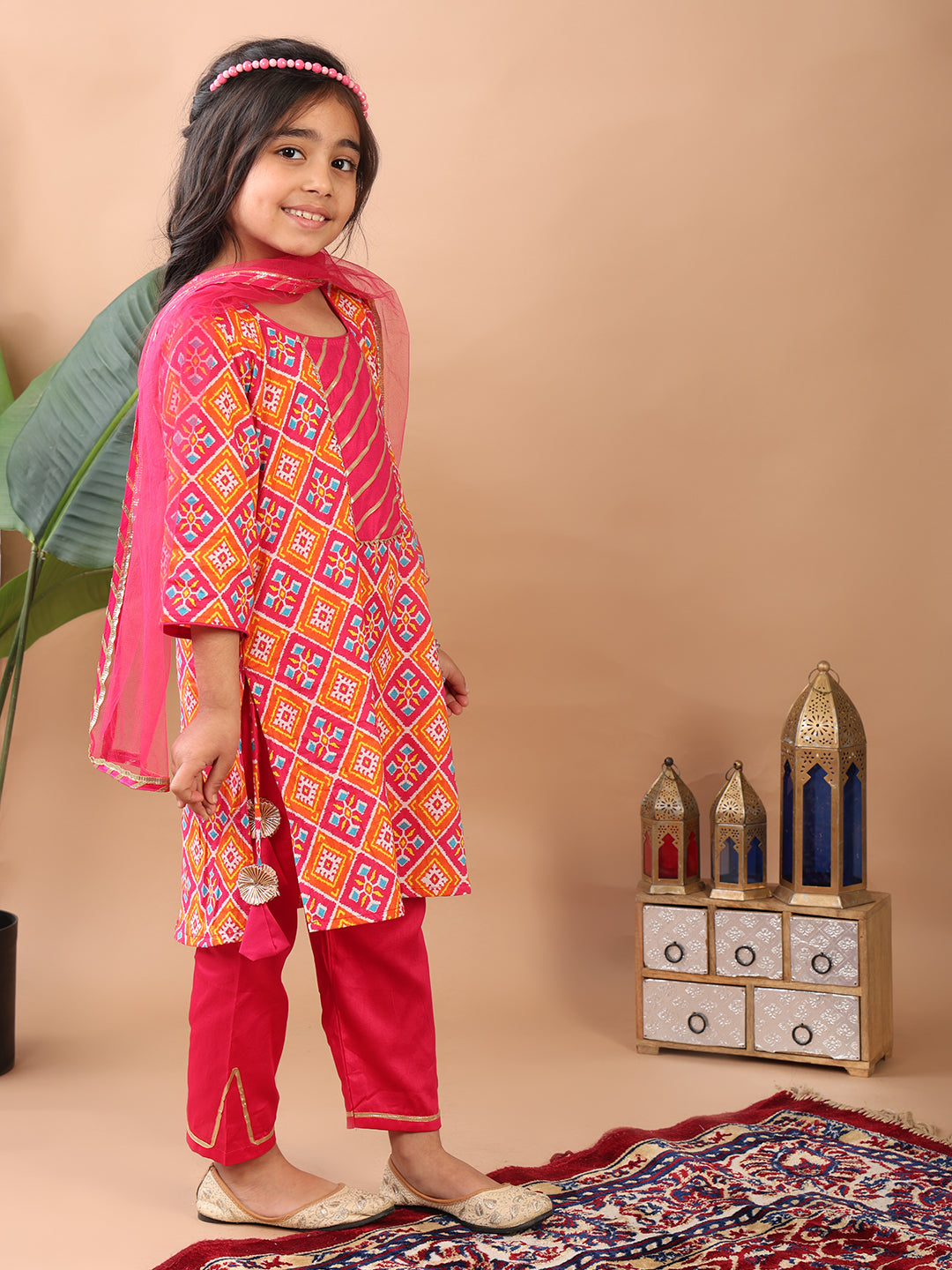 Red Kurti paired with pink Plazo pant and dupatta
