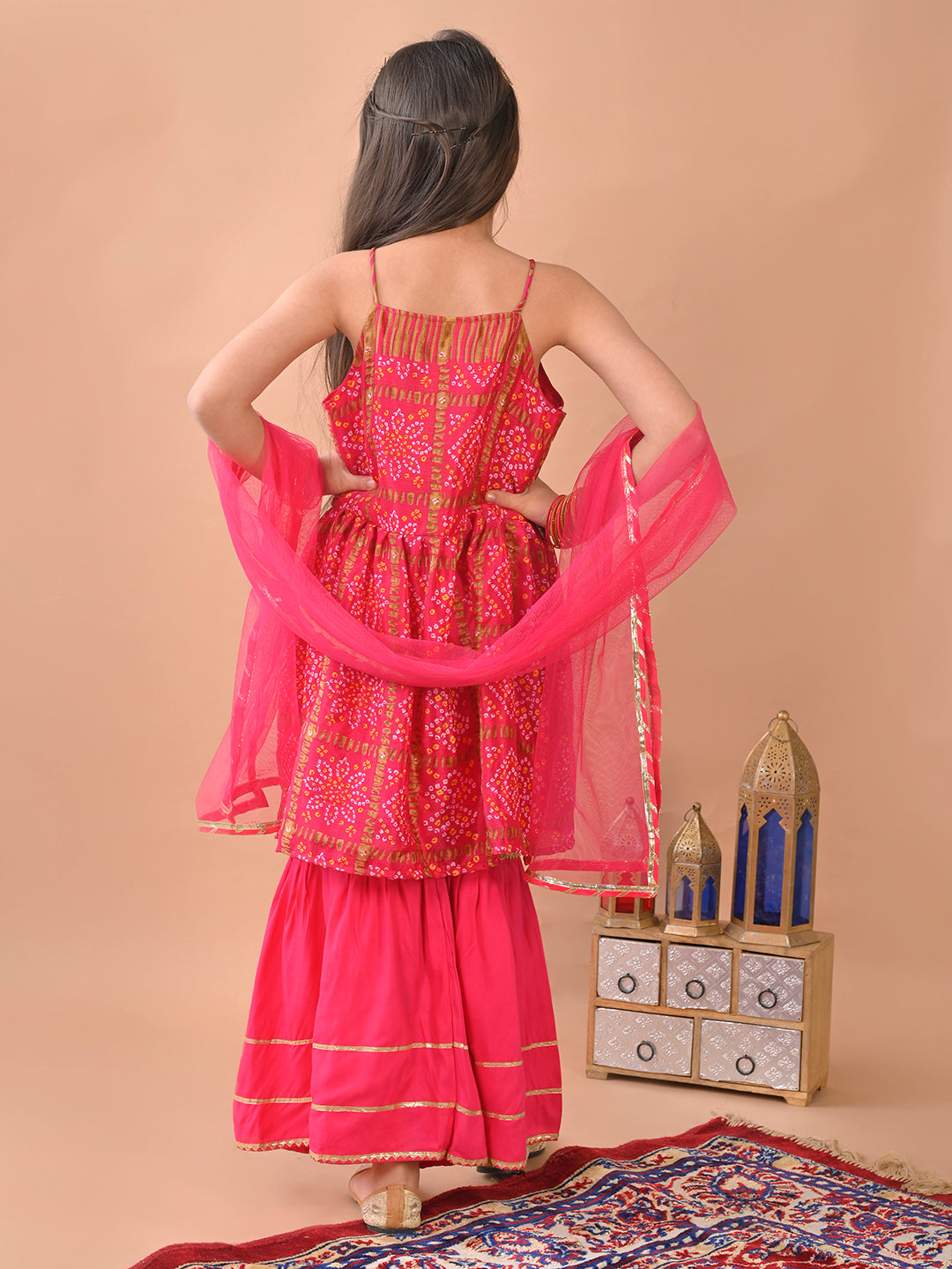 Pink bandez sleeveless Kurti paired with pink sharara pant and dupatta