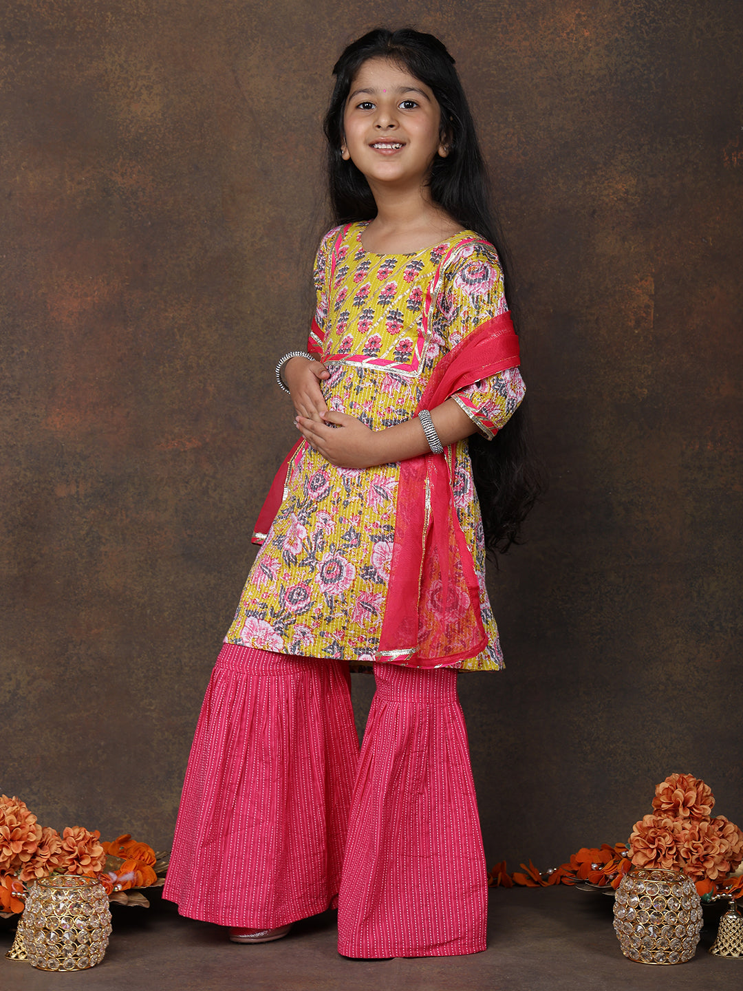 Yellow katha kurti with Pink sharara pant and dupatta
