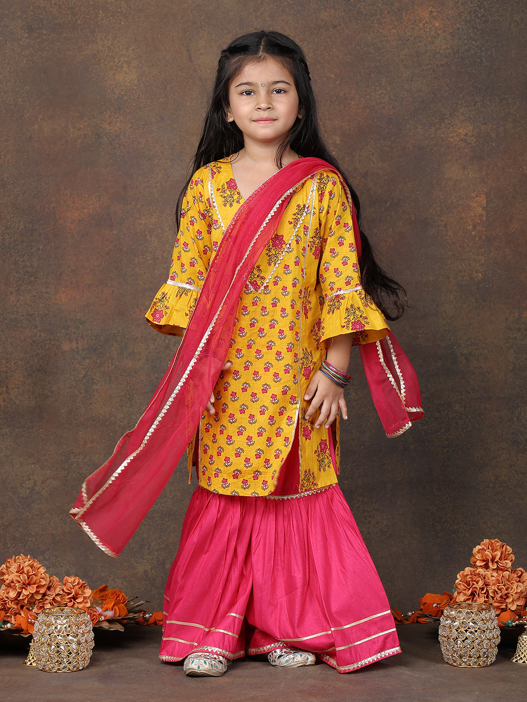 Yellow 3/4 sleeves printed Kurti with Pink sharara pant and dupatta