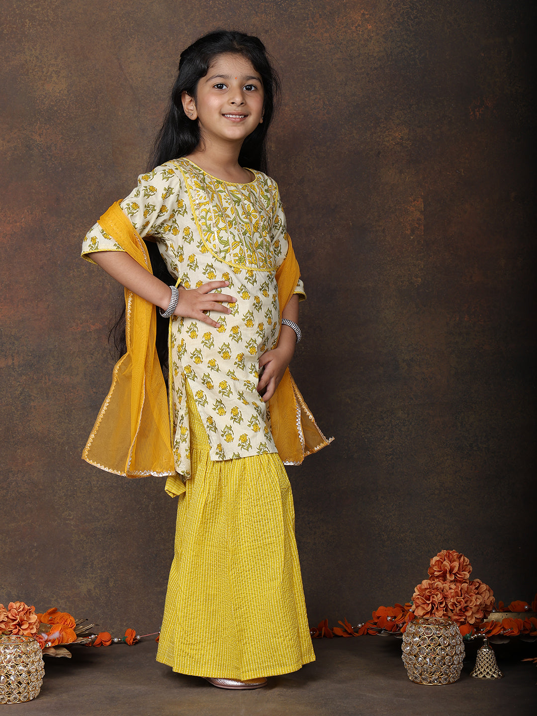 Yellow Kurti with Yellow sharara pant and dupatta