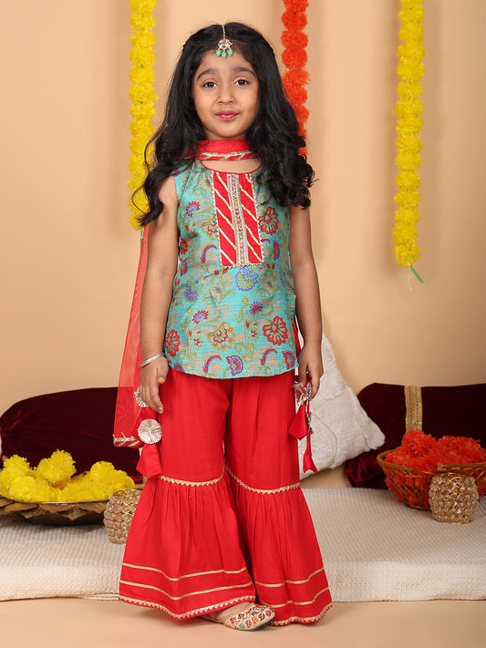 Green printed sleeveless kurti with Red sharara and dupatta