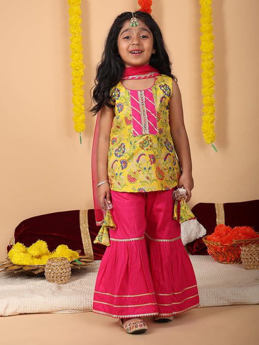 Yellow printed sleeveless kurti with Pink sharara and dupatta