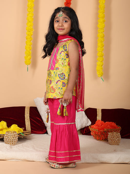 Yellow printed sleeveless kurti with Pink sharara and dupatta
