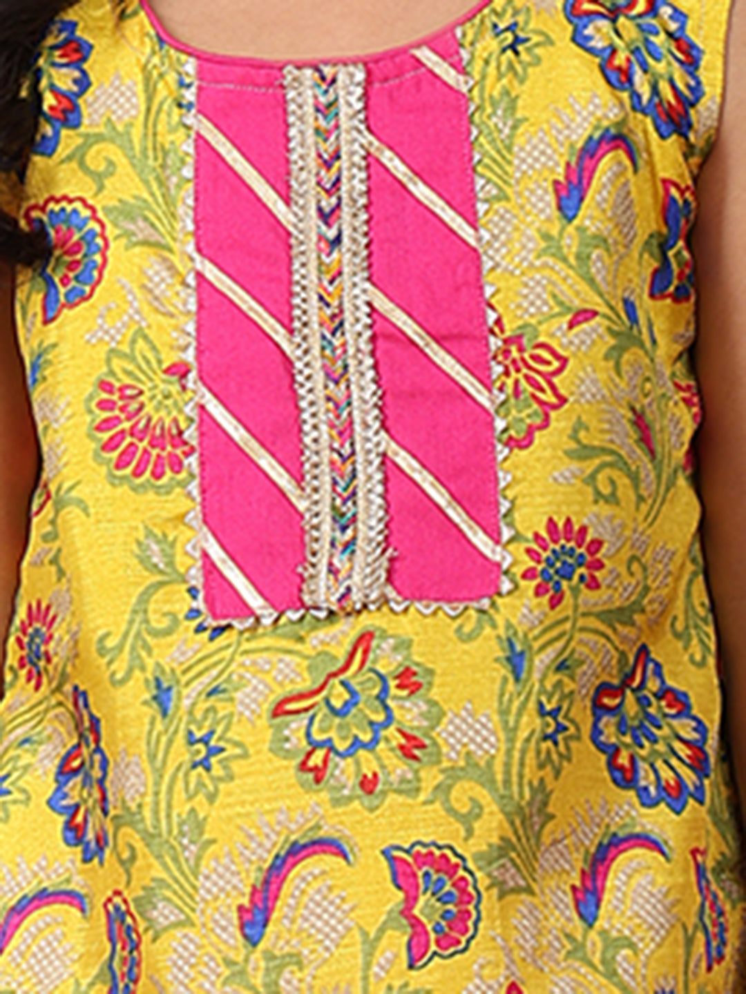 Yellow printed sleeveless kurti with Pink sharara and dupatta