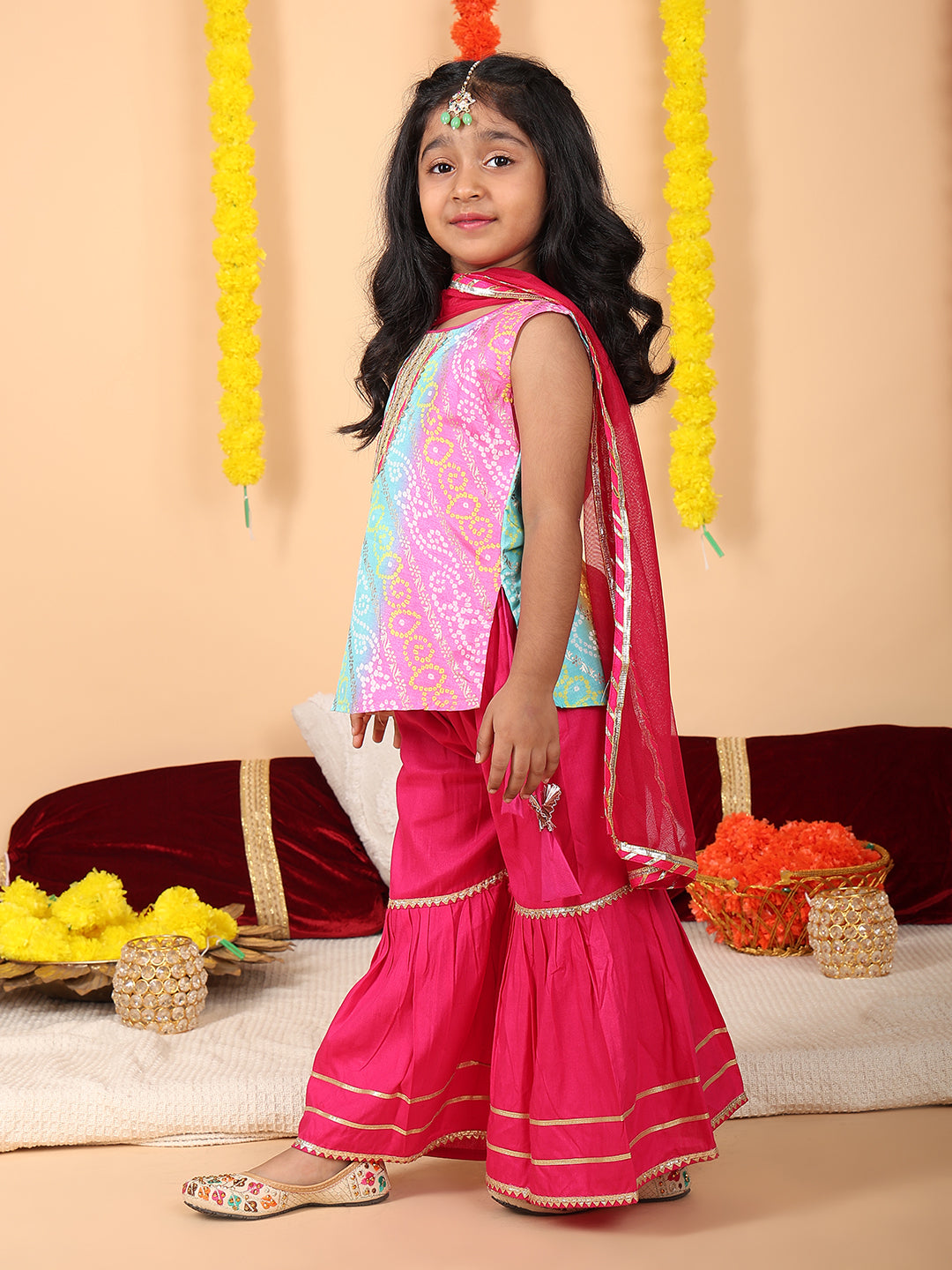 Multi Color printed sleeveless kurti with Pink sharara and dupatta