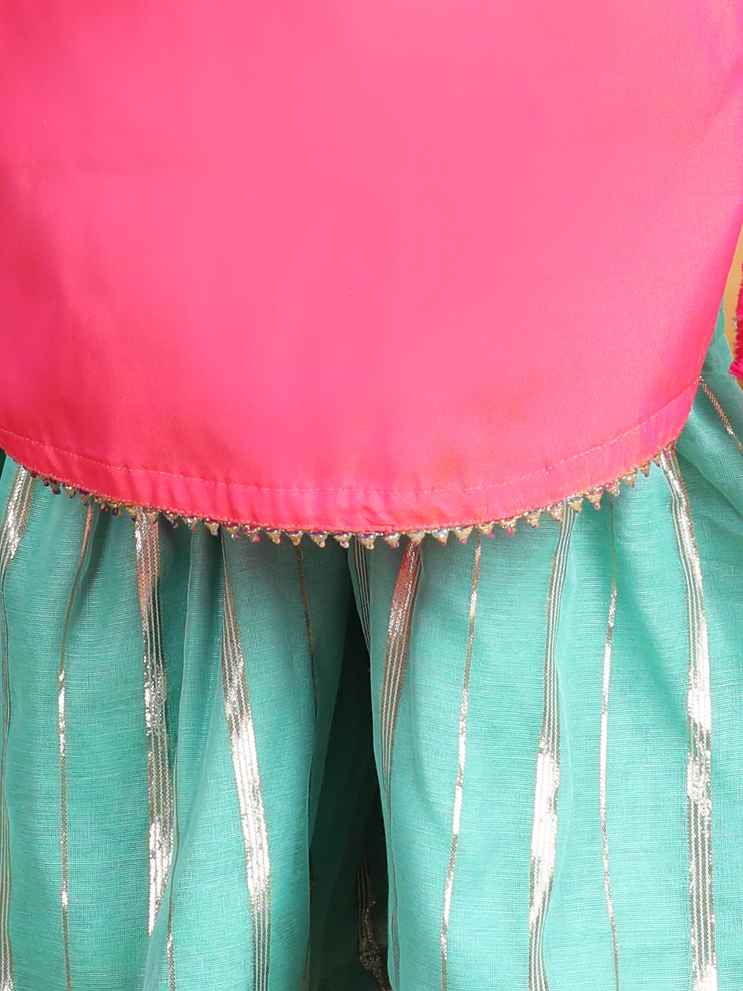 Pink embroidered Kurti paried with gold printed Sharara pant