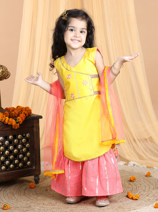 Yellow embroidered Kurti paried with gold printed Sharara pant