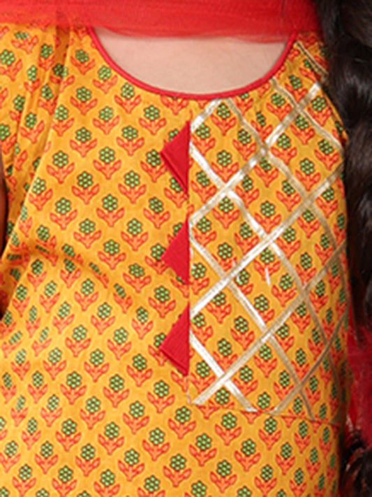 Yellow sleeveless cotton kurti with Red sharara pant and dupatta