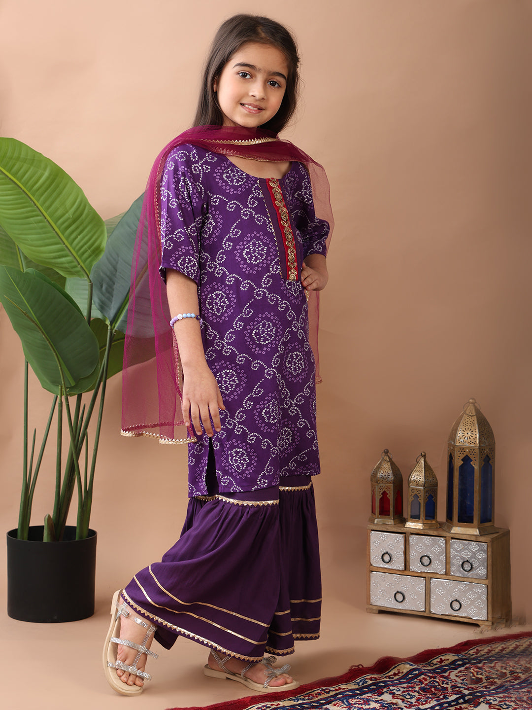 Purple kurti paired with sharara and dupatta