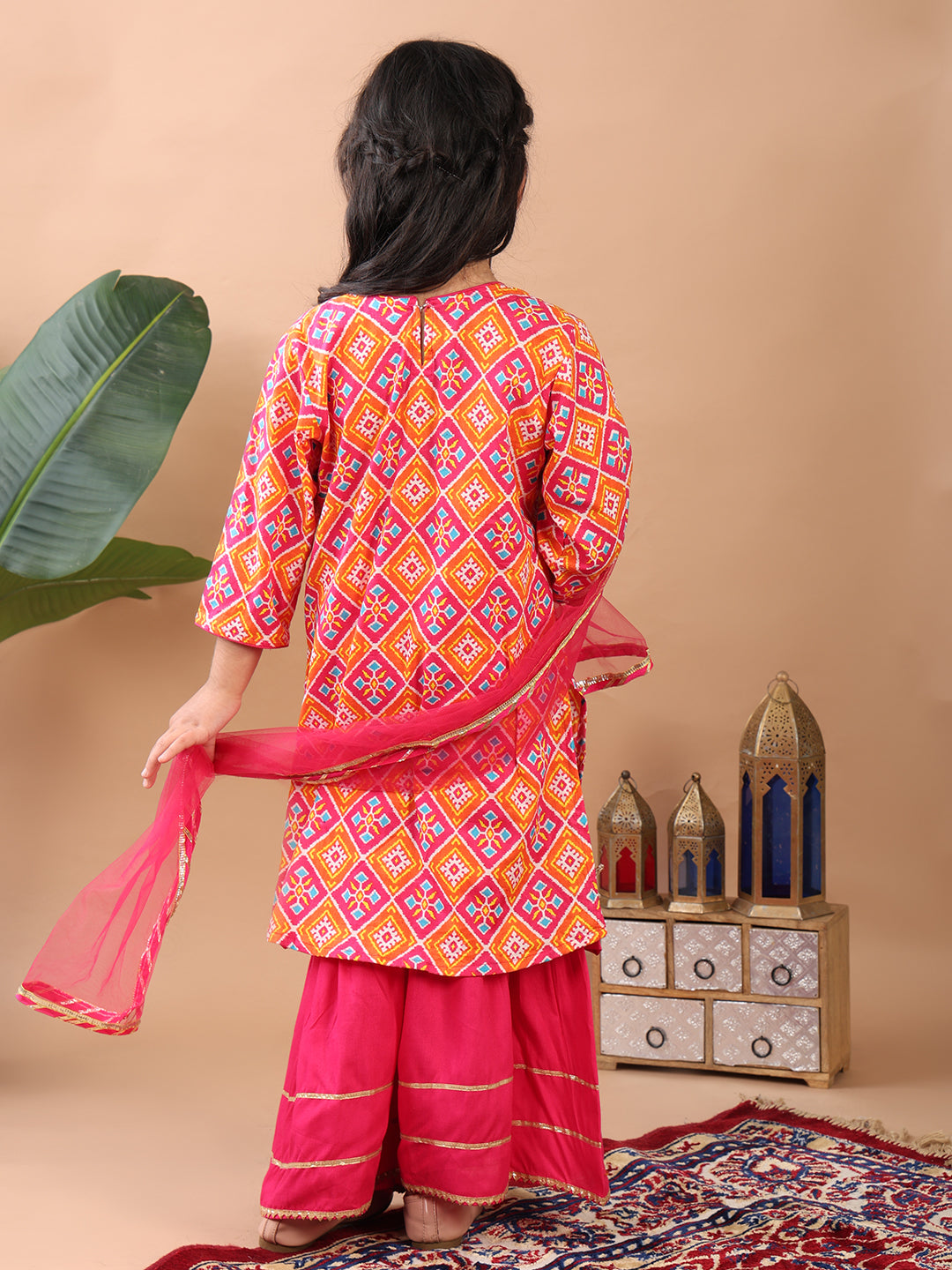 Red Kurti paired with pink sharara pant and dupatta