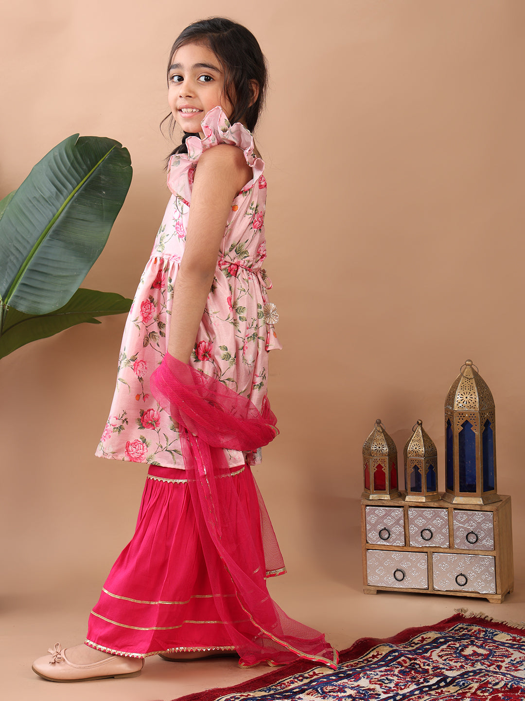 Pink Floral printed sleeveless Kurti paired with pink sharara pant and dupatta