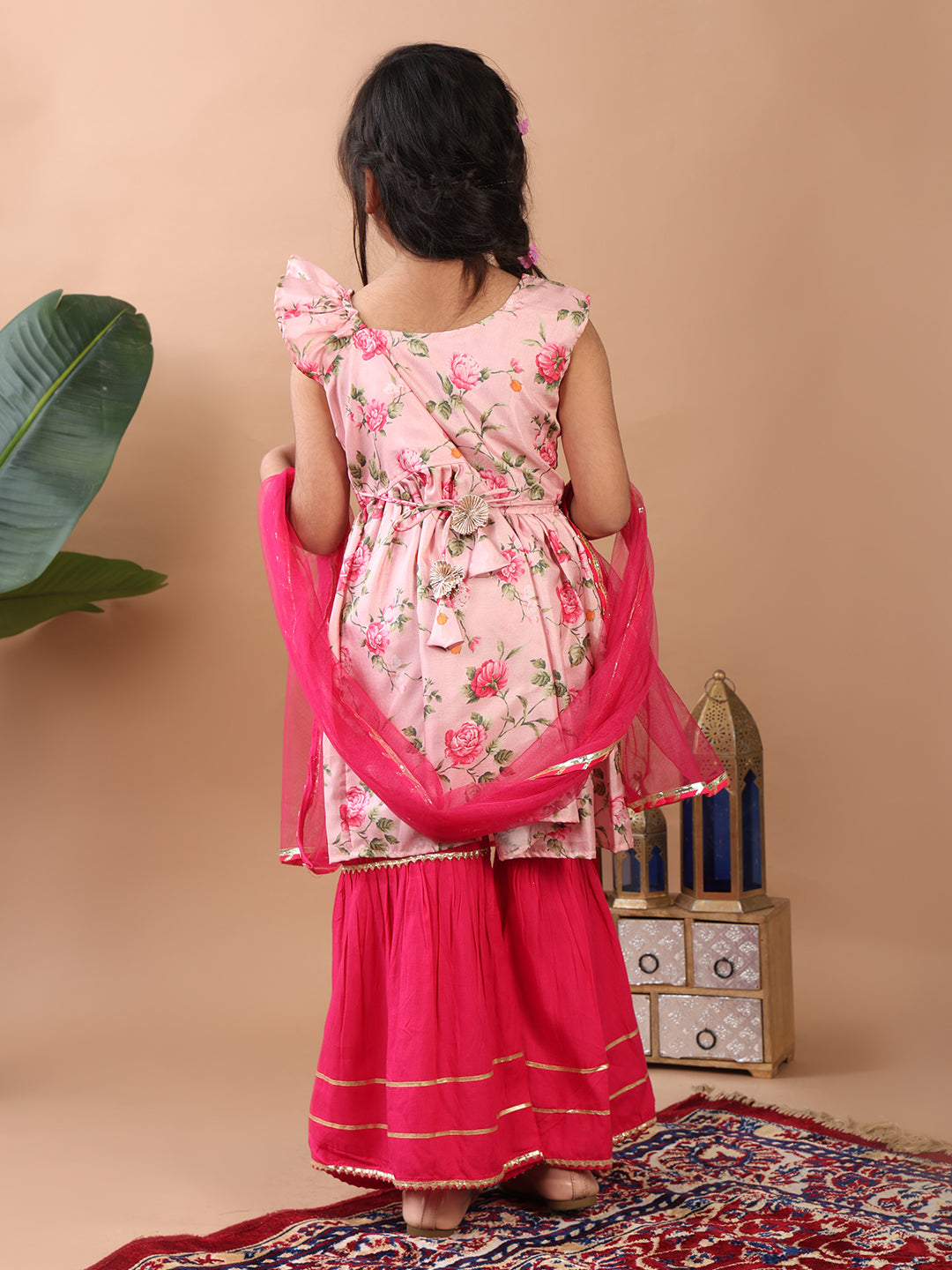 Pink Floral printed sleeveless Kurti paired with pink sharara pant and dupatta