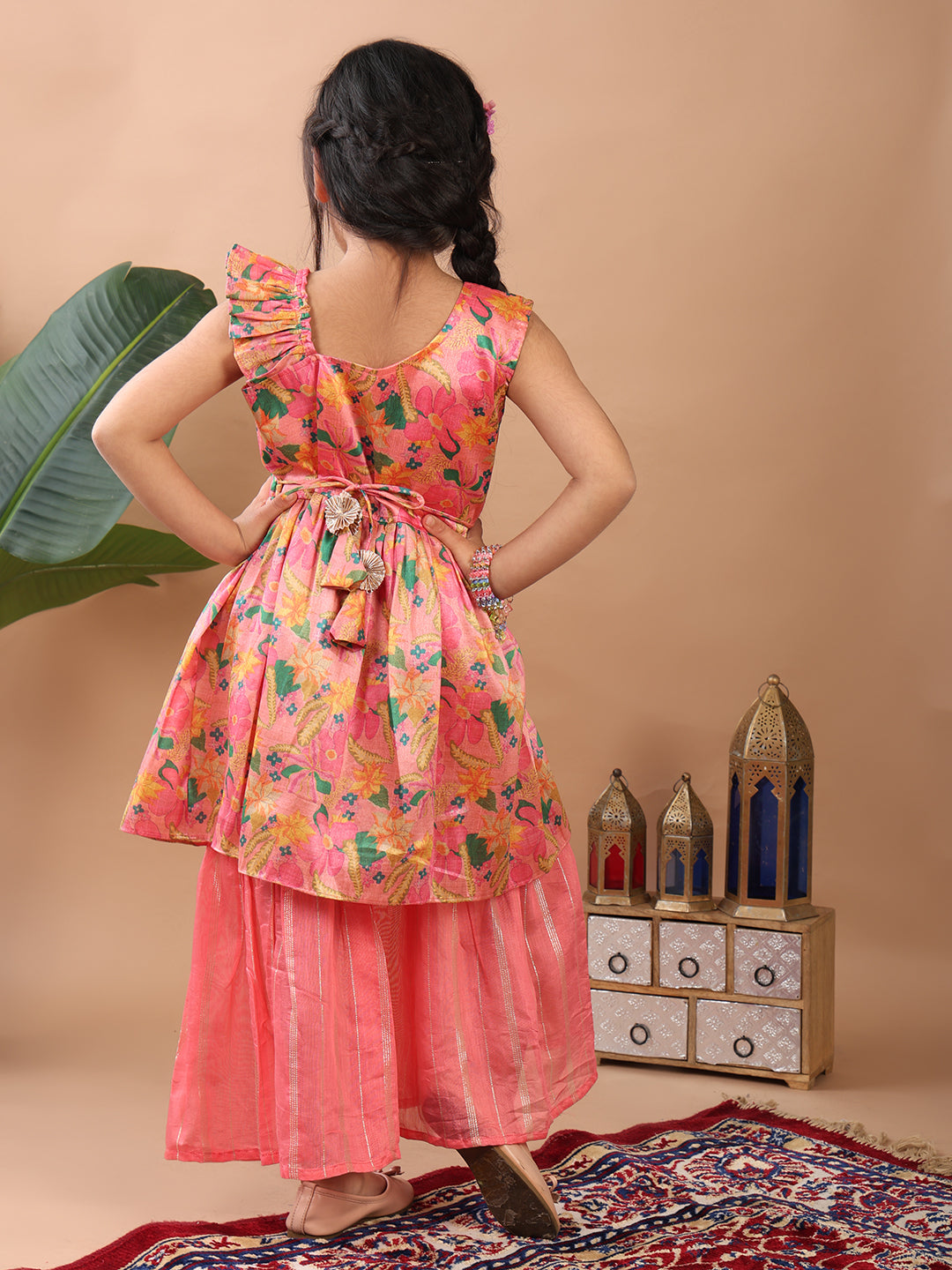 Pink Floral printed sleeveless Kurti paired with pink Lurex sharara pant and dupatta