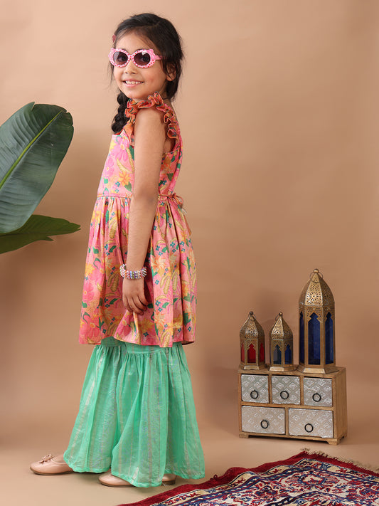 Pink Floral printed sleeveless Kurti paired with Green lurex sharara pant and dupatta
