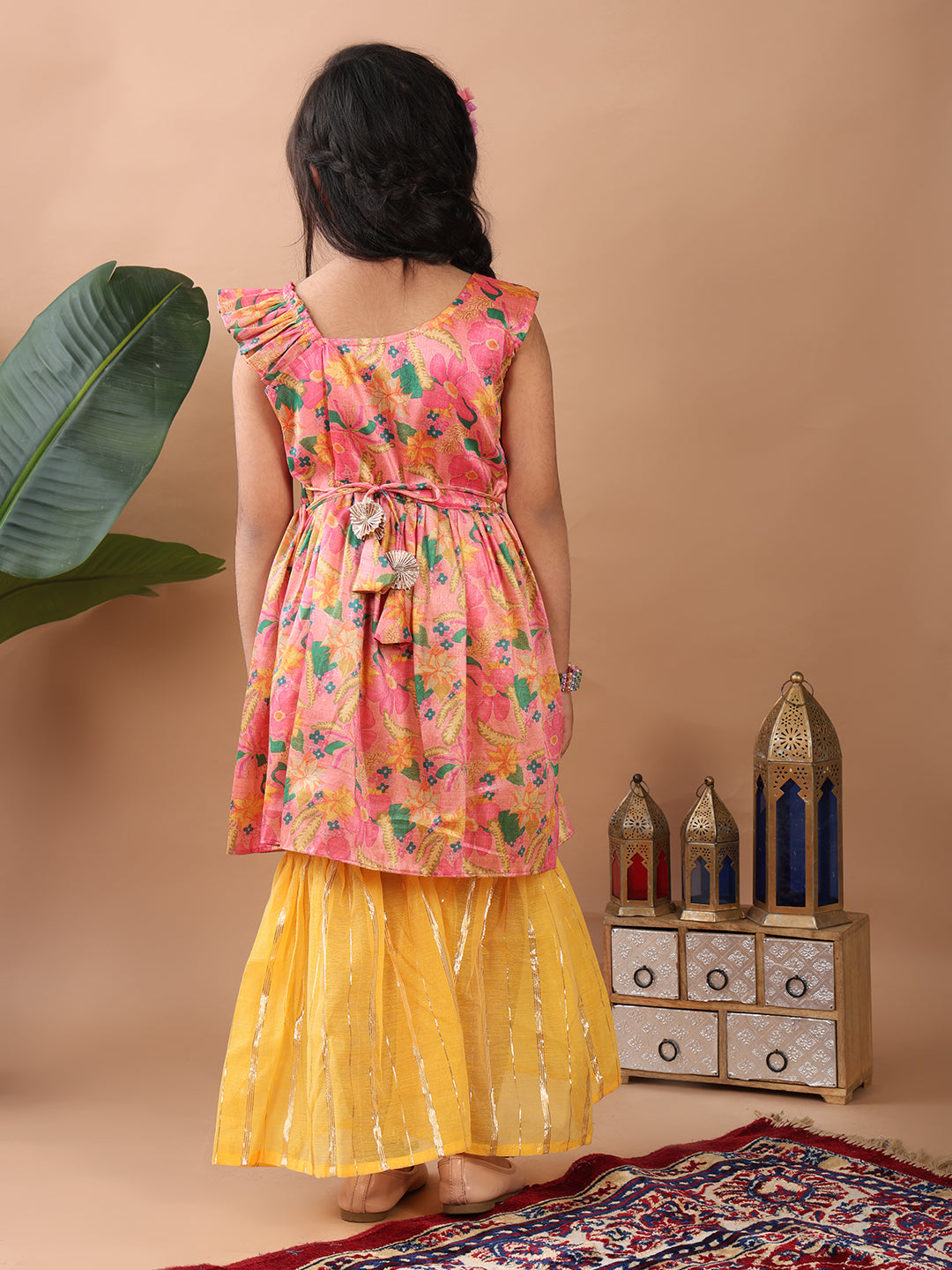 Pink Floral printed sleeveless Kurti paired with Yellow Lurex sharara pant and dupatta