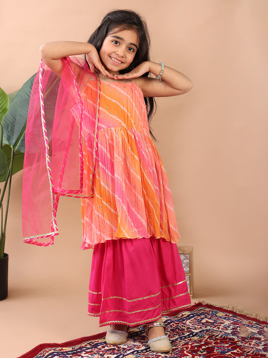 Pink Crushed Lehriya printed sleeveless Kurti paired with pink sharara pant and dupatta