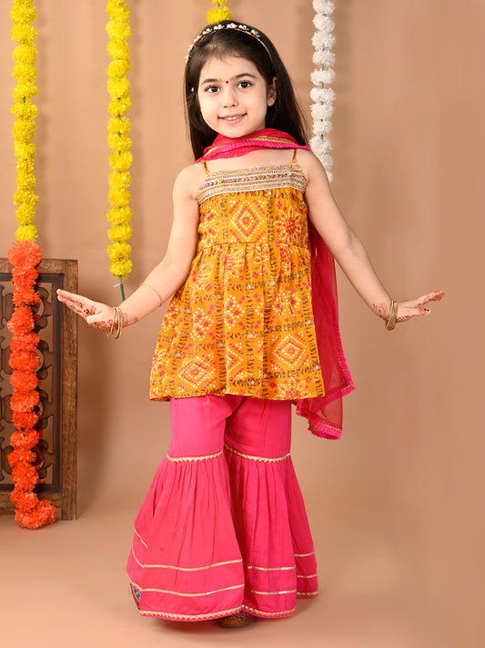 Yellow sleeveless muslin kurti with Sharara and dupatta