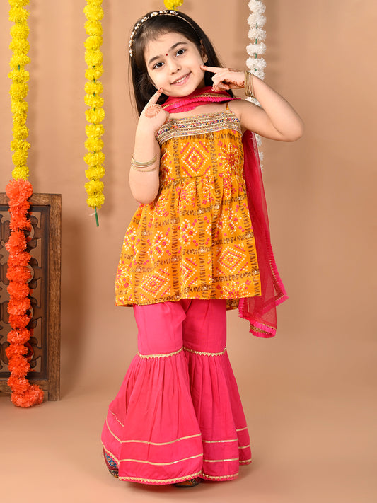 Yellow sleeveless muslin kurti with Sharara and dupatta