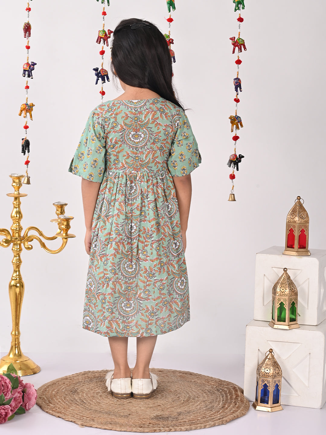 Green Dress with lace work at yoke