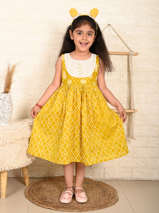 Yellow Sleeveless Dress with white patchwork at neck