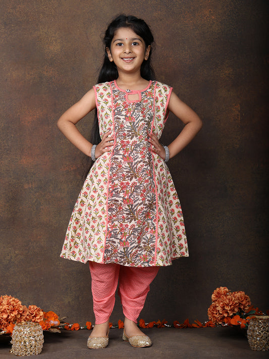 Peach Floral Printed angrakha style sleeveless Kurti paired with peach Dhoti