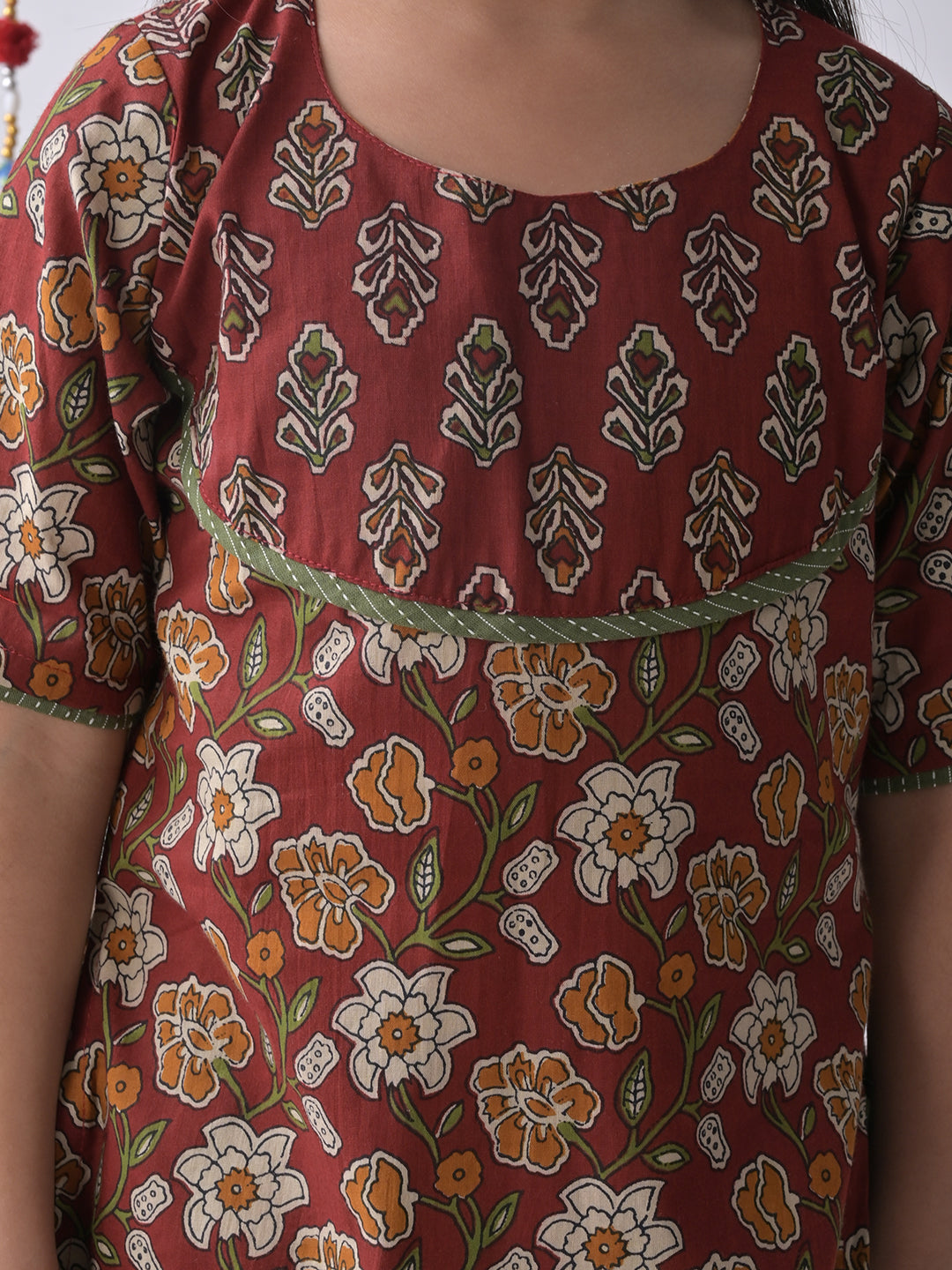 Maroon Printed Kurti with green katha dhoti
