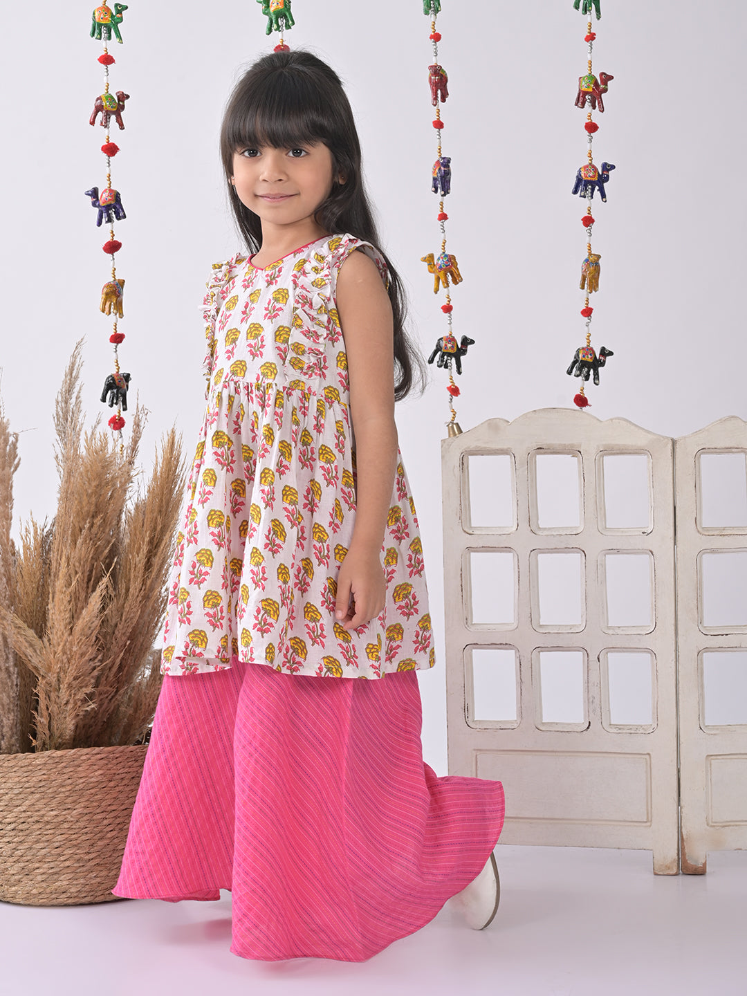 White Cotton Kurti paried with Pink plazo