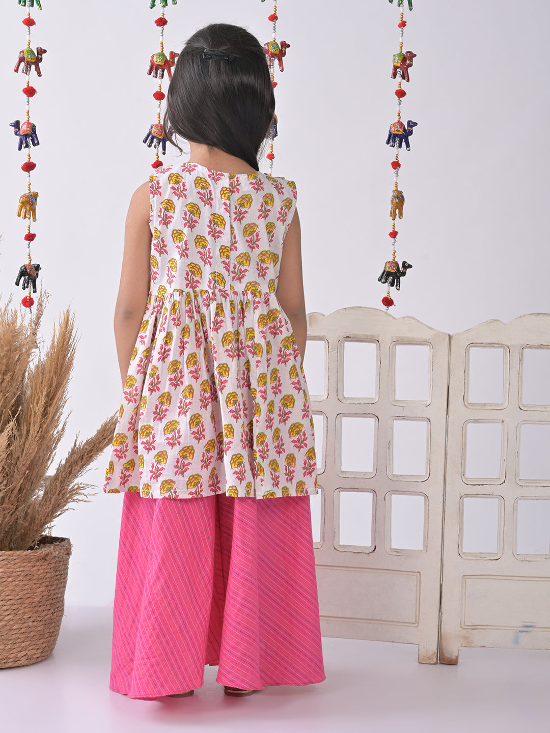 White Cotton Kurti paried with Pink plazo