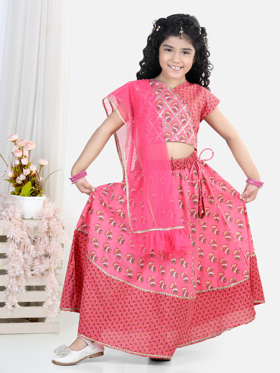 Pink floral printed lace embellished top with stripped lehenga and dupatta