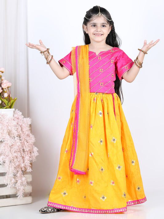 Pink brocade top with yellow lehenga and dupatta
