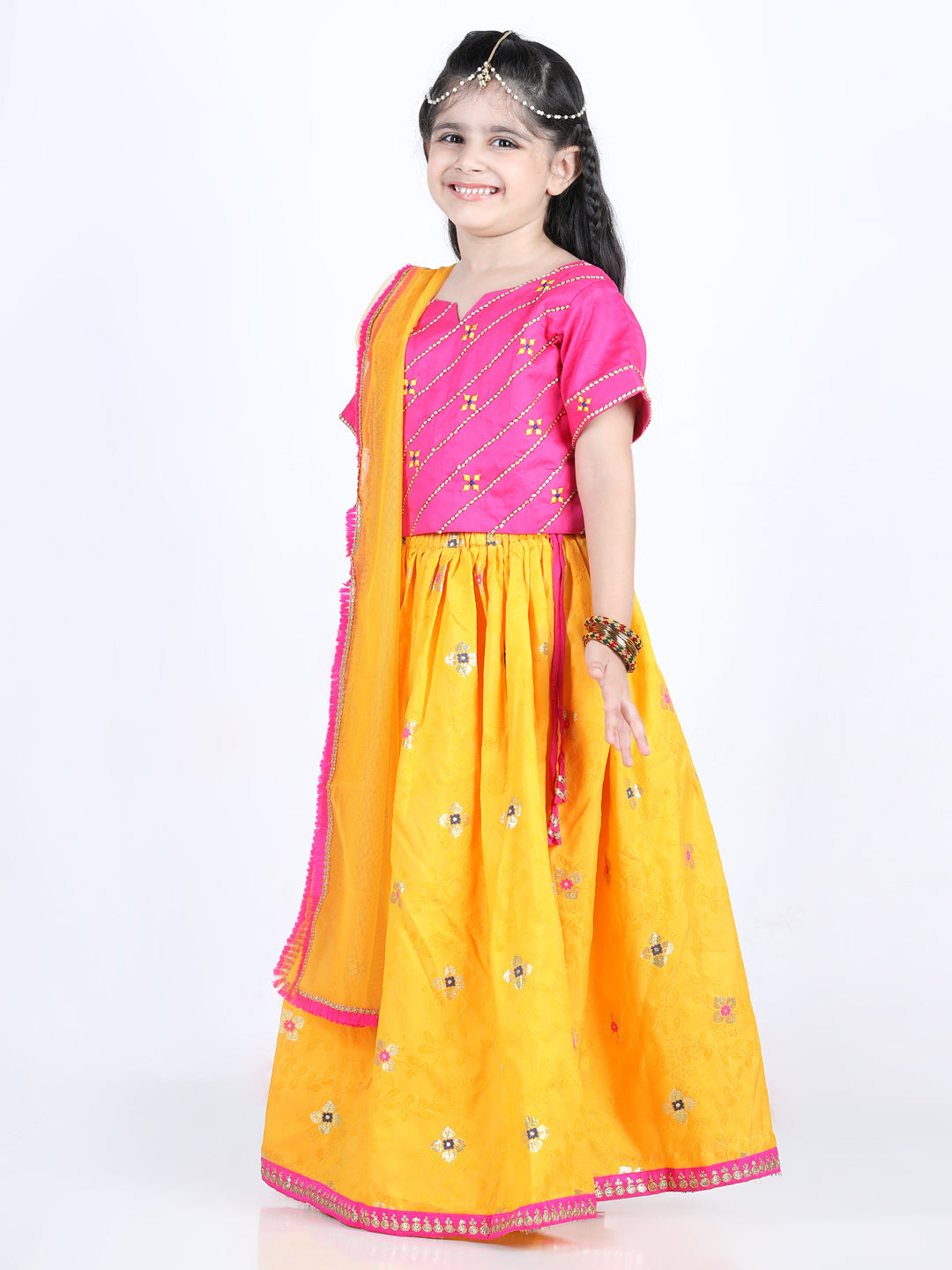 Pink brocade top with yellow lehenga and dupatta