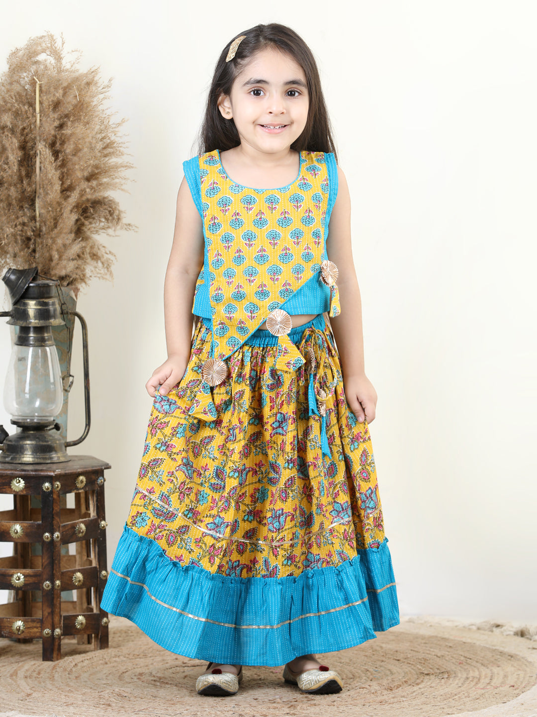 Yellow Cotton Katha Floral Printed Top with Tassels & Layered Lehenga