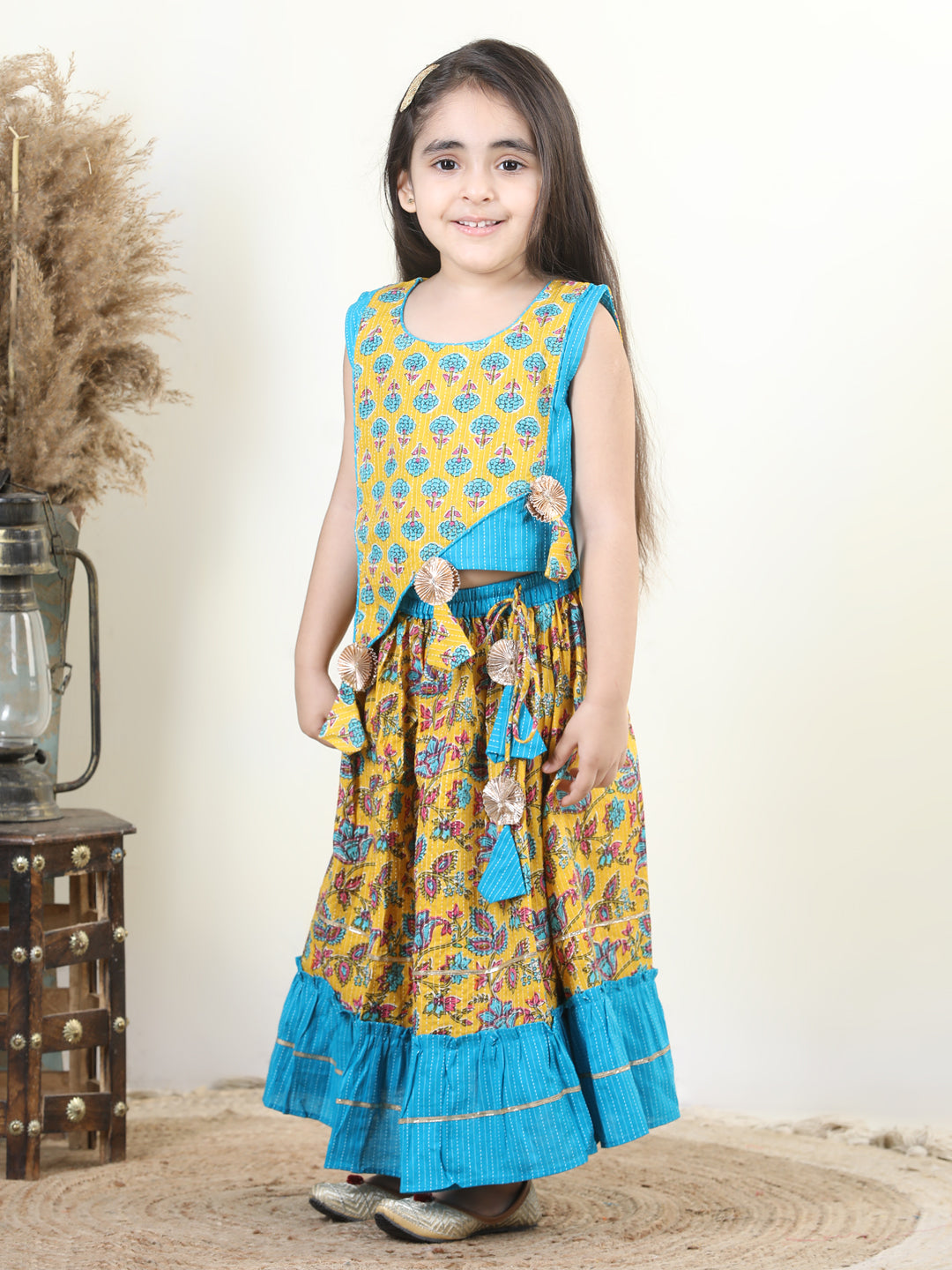 Yellow Cotton Katha Floral Printed Top with Tassels & Layered Lehenga