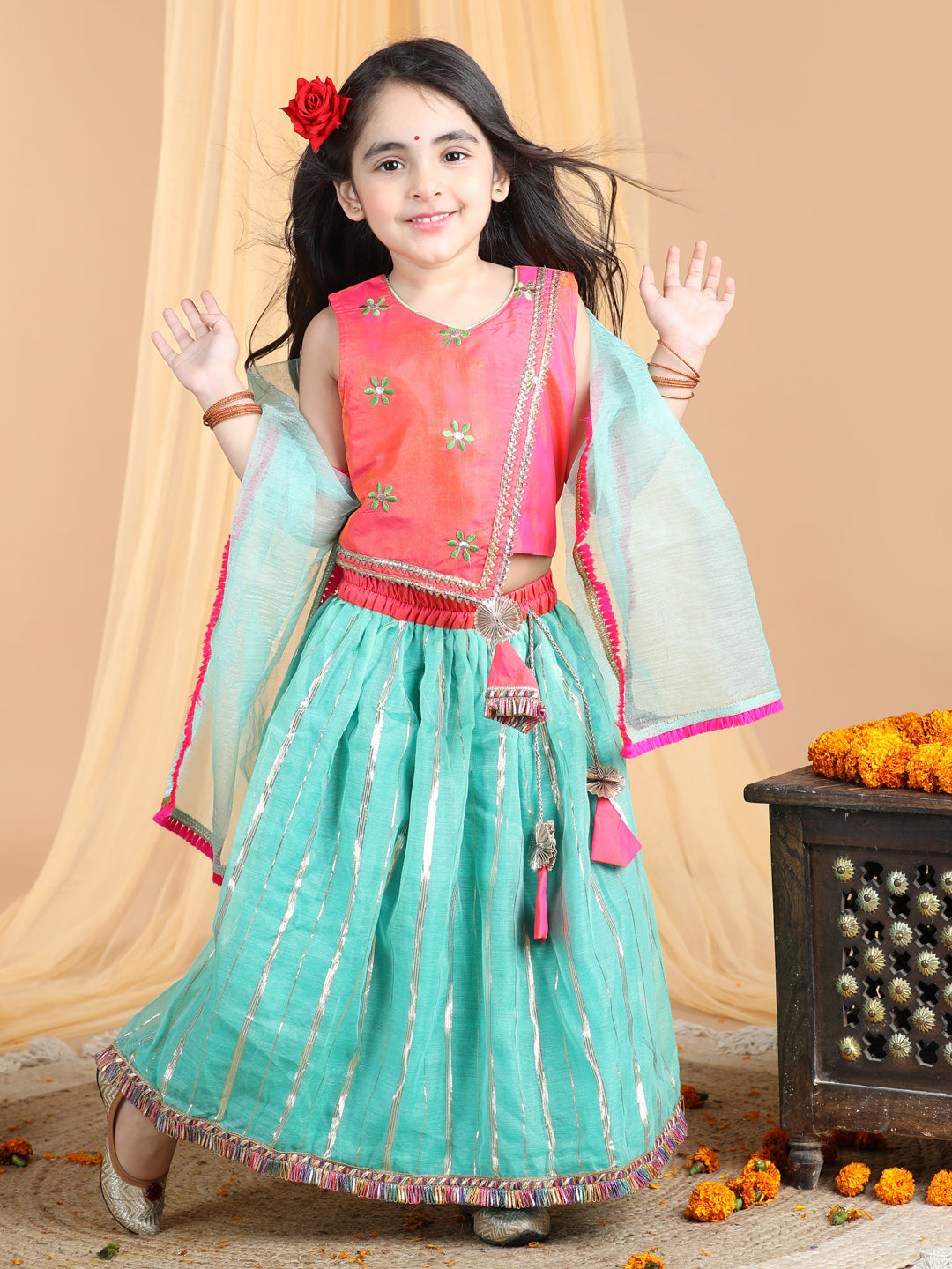 Pink Top with green gold printed lehenga and dupatta