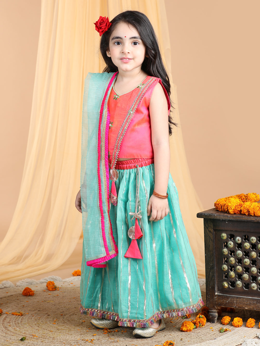 Pink Top with green gold printed lehenga and dupatta