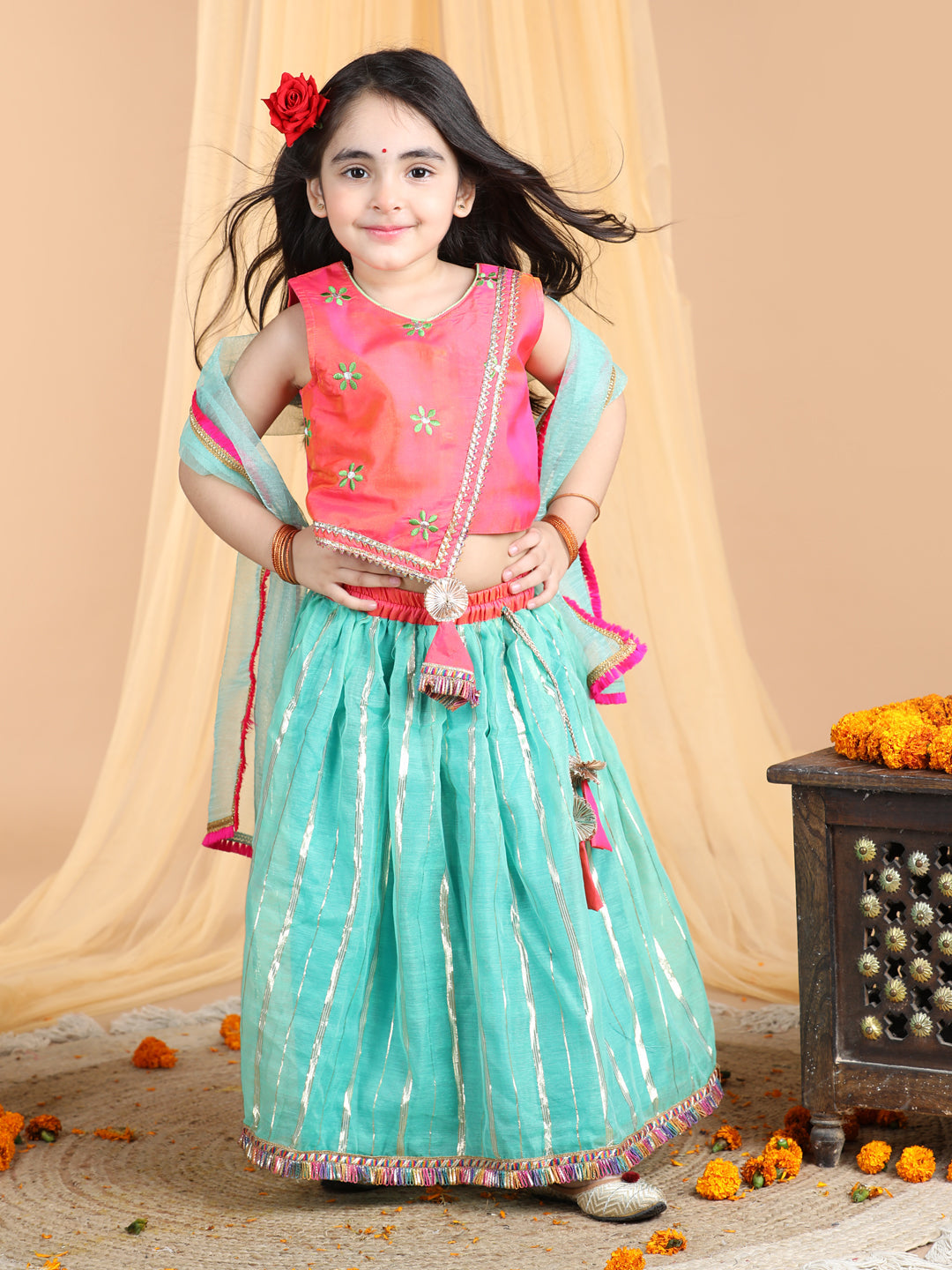 Pink Top with green gold printed lehenga and dupatta