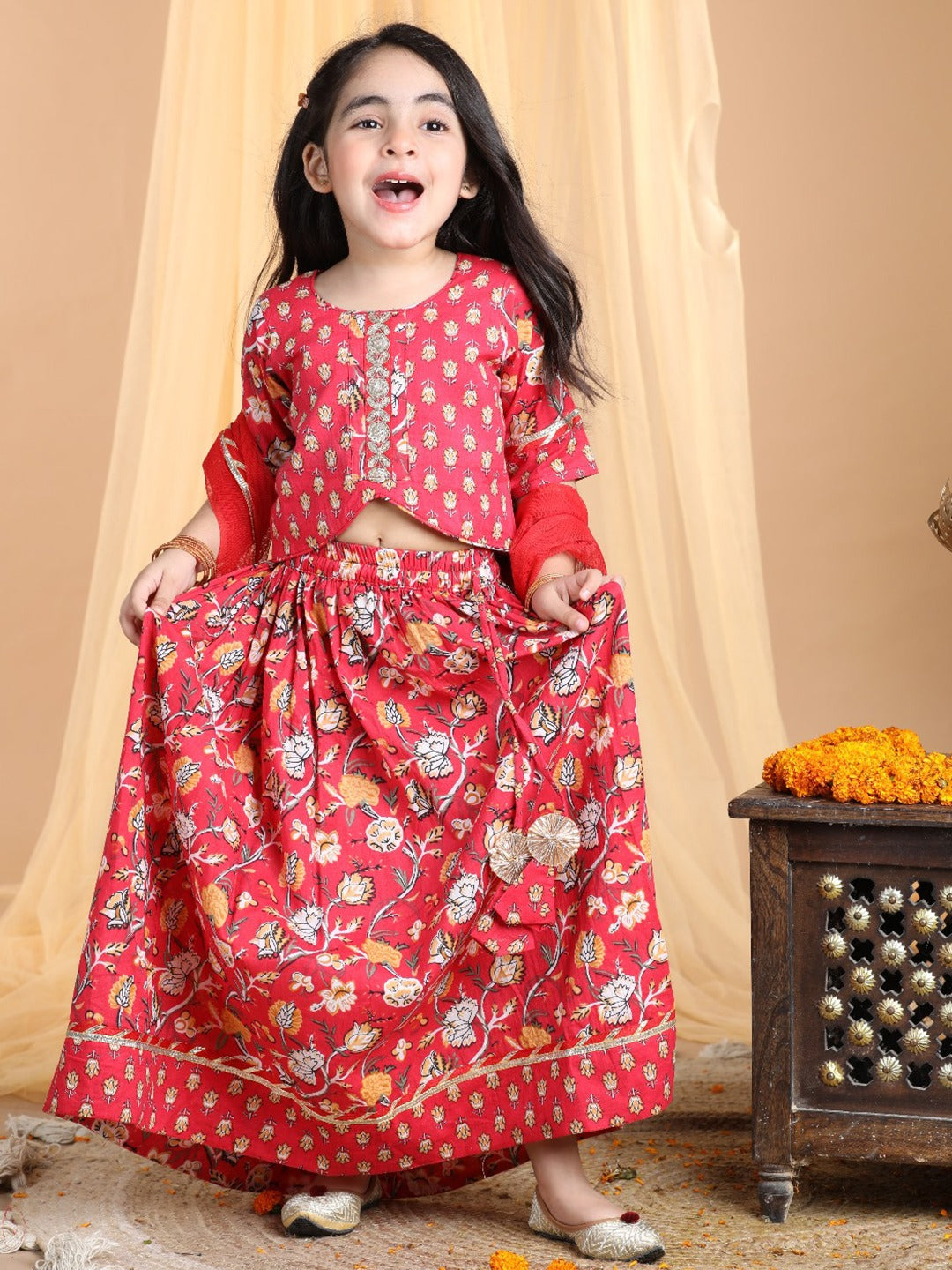 Floral printed Lehenga paired with lace work top and dupatta